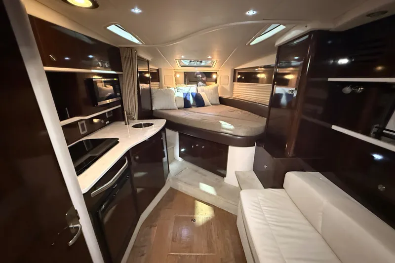 Slide: The Image of Luxurious cabin interior of 2017 Sea Ray Sundancer 330 yacht with plush bedding. - 45