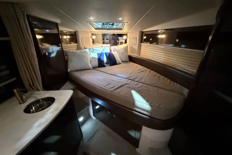 Slide: The Image of Luxurious interior of 2017 Sea Ray Sundancer 330 yacht with cozy bedding and modern amenities. - 48