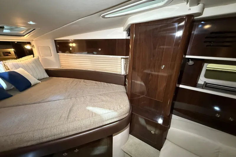 Slide: The Image of 2017 Sea Ray Sundancer 330 galley with sink, stovetop, and microwave. - 50