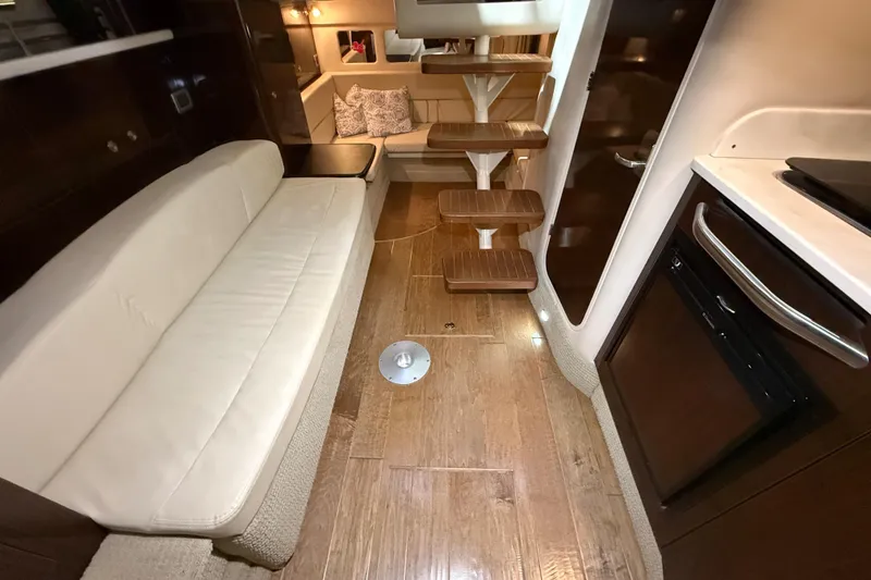 Slide: The Image of Compact bathroom in 2017 Sea Ray 330 Sundancer yacht with sink and toilet. - 63