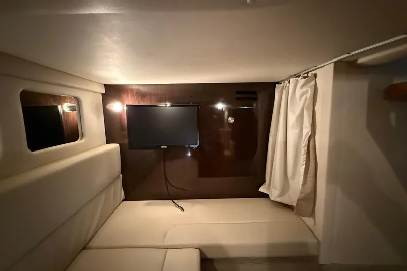 Slide: The Image of Engine compartment of a 2017 Sea Ray Sundancer 330 boat, featuring a Mercury 6.2L engine. - 69