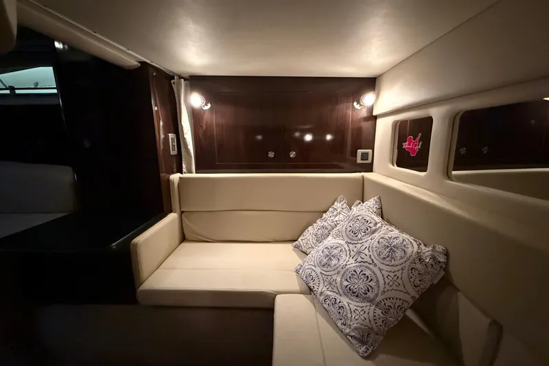 Slide: The Image of Engine compartment of a 2017 Sea Ray Sundancer 330, featuring dual MerCruiser 300 engines. - 70