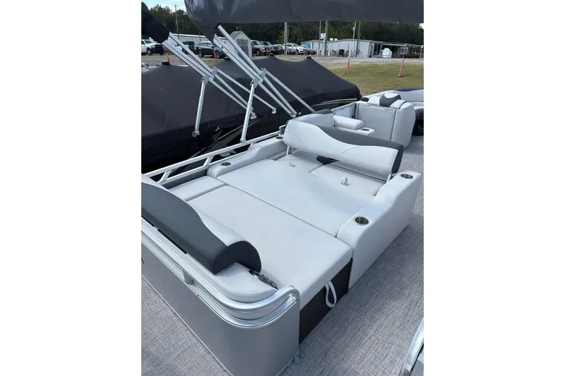 Slide: The Image of 2025 Avalon LSZ ENTERTAINER pontoon boat with spacious seating and modern design. - 1