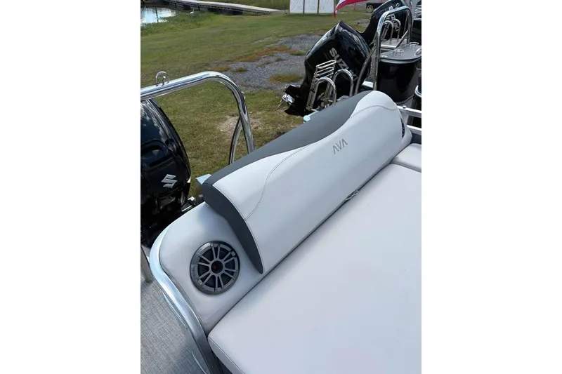 Slide: The Image of 2025 Avalon LSZ Entertainer boat seat with speaker, featuring sleek design and modern amenities. - 2
