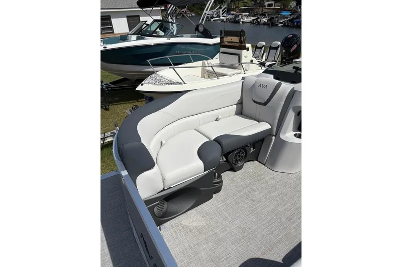 Slide: The Image of 2025 Avalon LSZ Entertainer boat with sleek seating and modern design. - 7