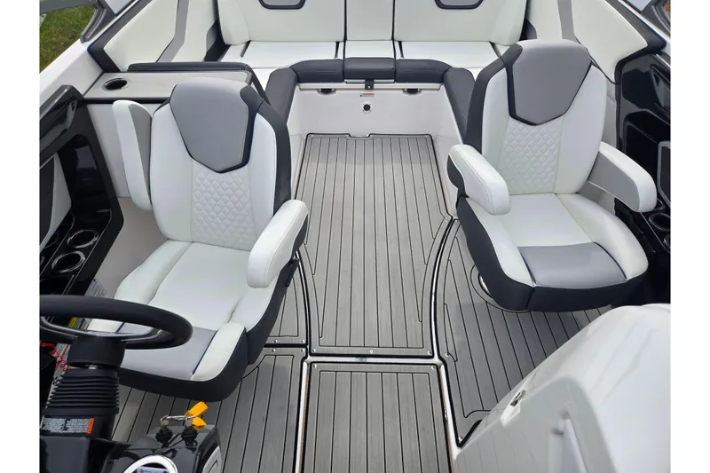 Slide: The Image of 2021 Yamaha Boats 252S interior with sleek seating and modern design. - 21