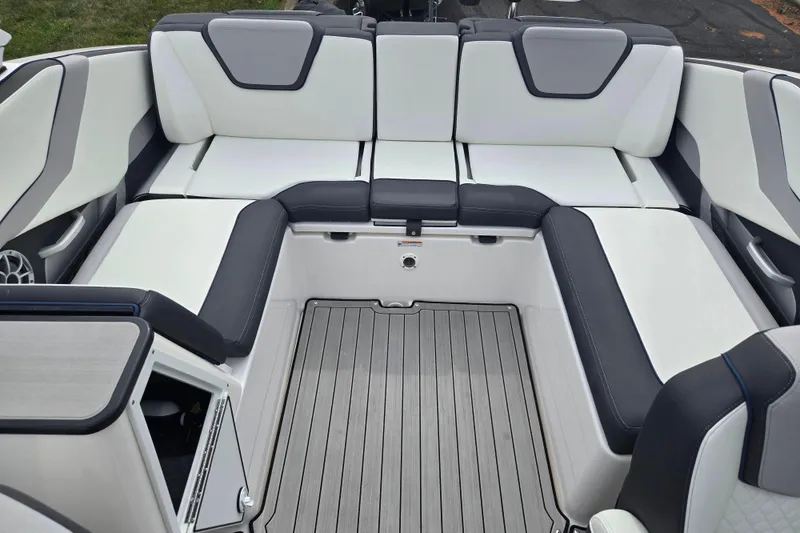 Slide: The Image of 2021 Yamaha Boats 252S interior with sleek seating and modern design. - 23