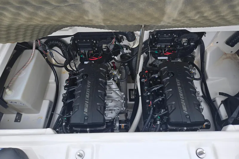 Slide: The Image of 2021 Yamaha Boats 252S engine compartment with dual high-output engines. - 24