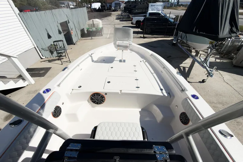 Slide: The Image of 2026 Sea Chaser 26 LX Special Edition boat interior at a showroom display. - 10