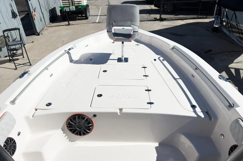 Slide: The Image of 2026 Sea Chaser 26 LX Special Edition boat interior with illuminated control panel. - 11