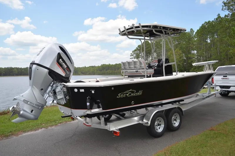 Slide: The Image of 2026 Sea Chaser 26 LX Special Edition boat interior with cushioned seating and modern design. - 18