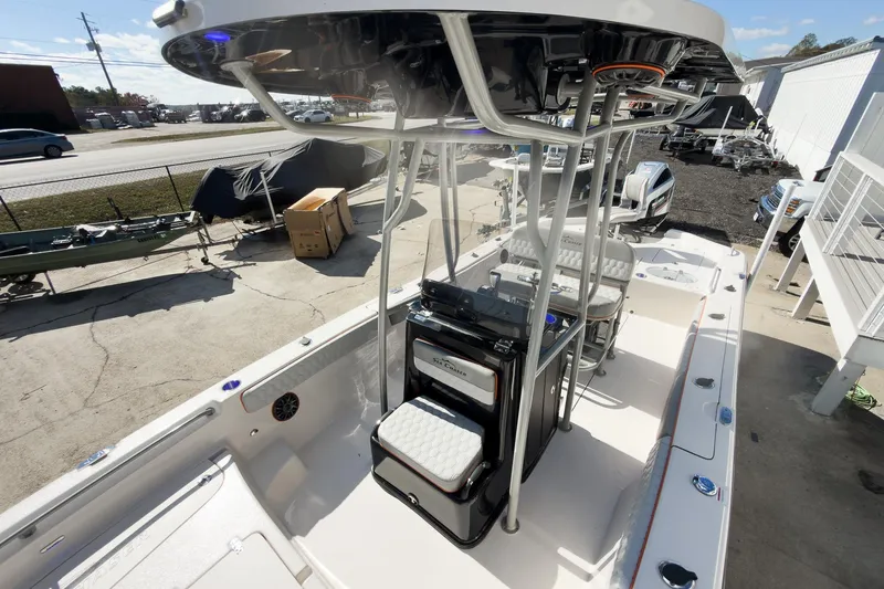 Slide: The Image of 2026 Sea Chaser 26 LX Special Edition boat interior with console and seating. - 19