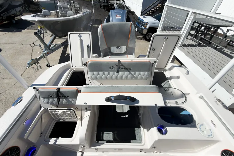 Slide: The Image of 2026 Sea Chaser 26 LX Special Edition boat interior, featuring spacious seating and modern design. - 23