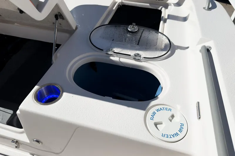 Slide: The Image of 2026 Sea Chaser 26 LX Special Edition boat deck with seating and storage compartments. - 24