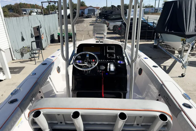 Slide: The Image of 2026 Sea Chaser 26 LX Special Edition boat with open storage compartments. - 25