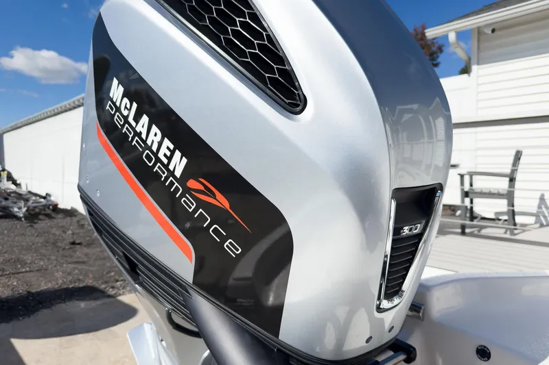 Slide: The Image of 2026 Sea Chaser 26 LX Special Edition boat with rod holders and speakers on the T-top. - 40