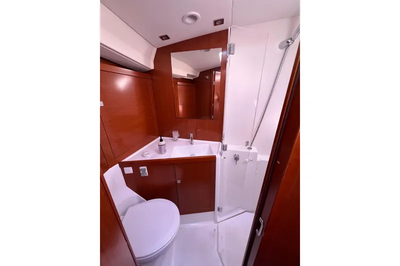 Slide: The Image of Luxurious bathroom in 2012 Beneteau Oceanis 45 yacht with wood accents and modern fixtures. - 27
