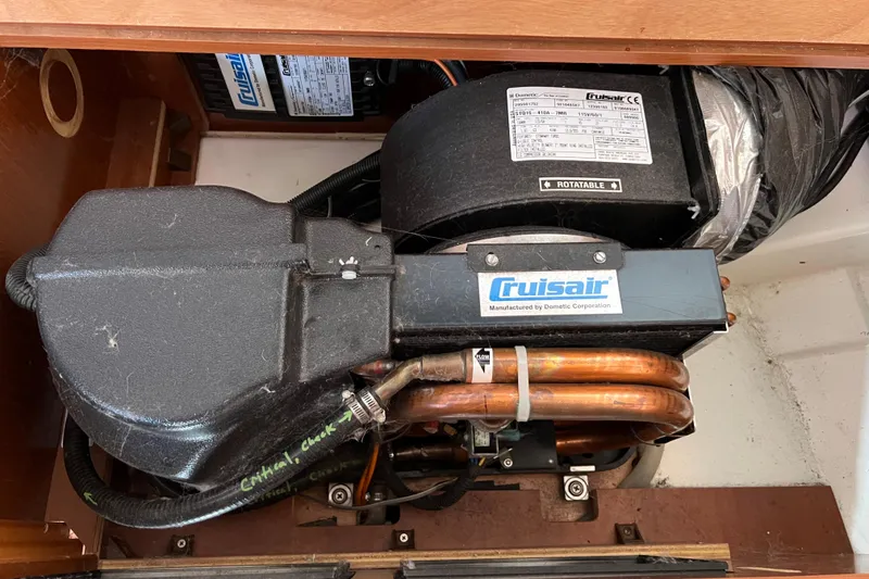 Slide: The Image of Cruisair air conditioning unit in 2012 Beneteau Oceanis 45 yacht engine room. - 31