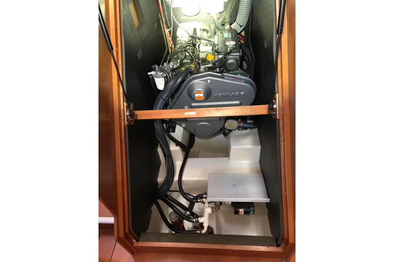 Slide: The Image of Engine compartment of 2012 Beneteau Oceanis 45 sailboat, featuring a Yanmar engine. - 36