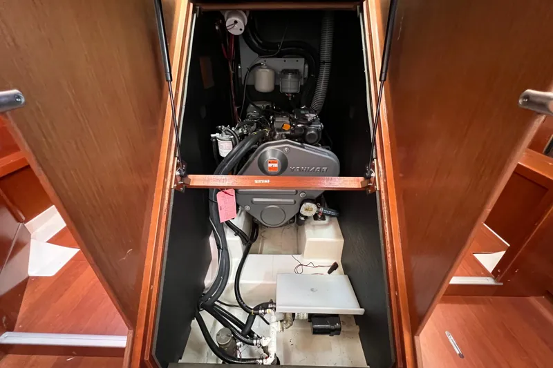 Slide: The Image of Engine compartment of 2012 Beneteau Oceanis 45 sailboat, featuring a Yanmar engine. - 37