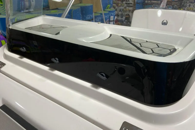 Slide: The Image of 2018 Scarab SB1195 Open boat console with black and white design. - 7