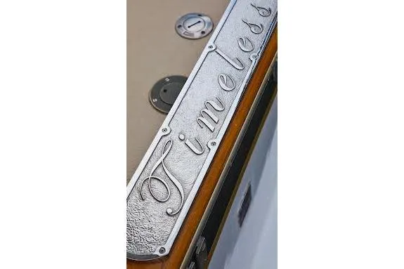 Slide: The Image of "Timeless" engraved on 1968 Burger Motor Yacht, showcasing elegant craftsmanship. - 29