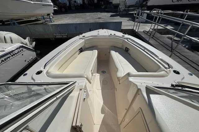 Slide: The Image of 2021 Grady-White Freedom 307 boat interior with spacious seating and sleek design. - 19