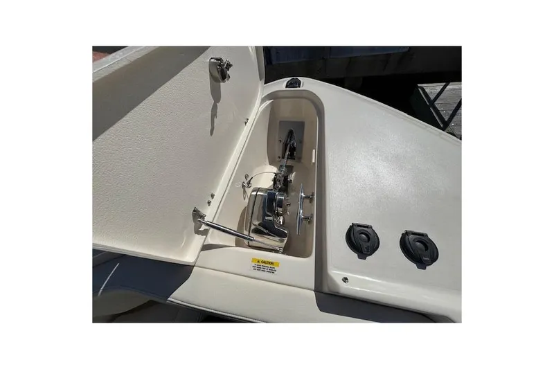Slide: The Image of 2021 Grady-White Freedom 307 boat anchor compartment with stainless steel fittings. - 20