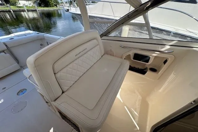 Slide: The Image of 2021 Grady-White Freedom 307 boat interior with luxurious seating and elegant design. - 24