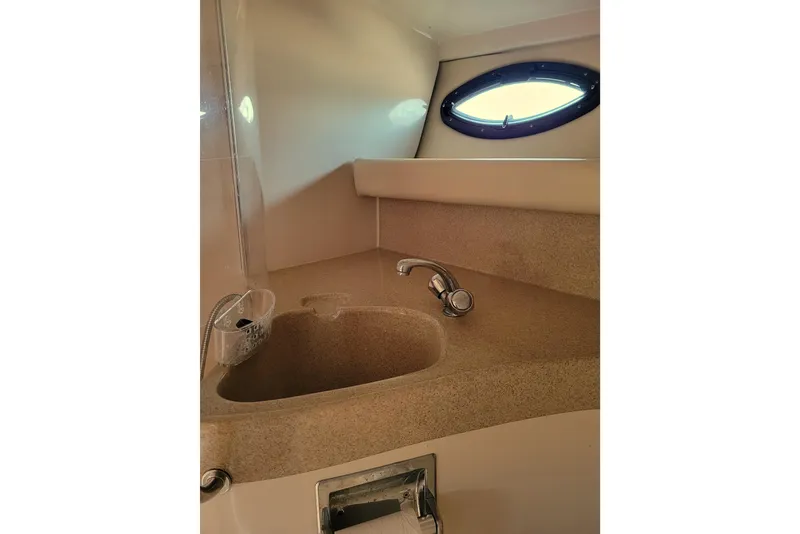 Slide: The Image of Enclosed Head with Sink and Vanity - 26