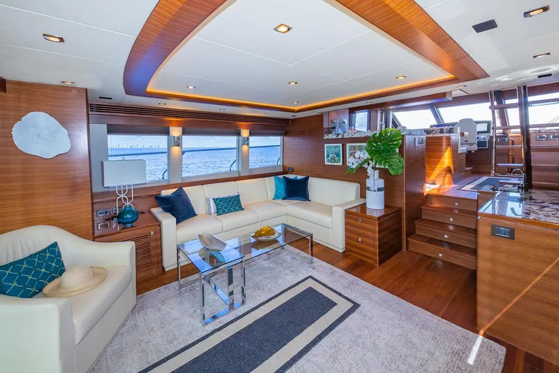 Slide: The Image of Luxurious 2019 Regency P65 yacht interior with elegant wood finishes and modern furnishings. - 29