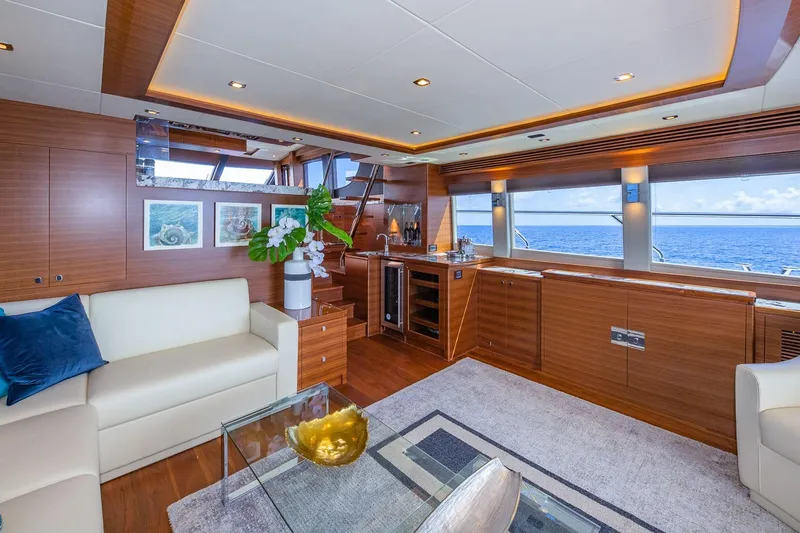 Slide: The Image of Luxurious Regency P65 yacht interior with elegant wood finishes and ocean view, 2019 model. - 31