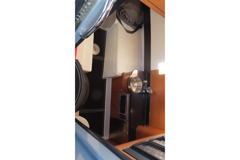 Slide: The Image of Interior view of 2017 Mystic M4200 boat, featuring sleek design and modern amenities. - 24