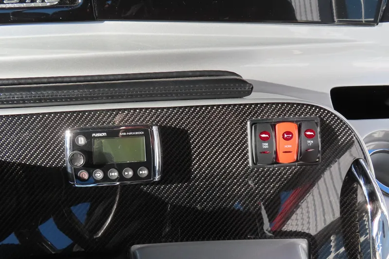 Slide: The Image of Carbon fiber dashboard of 2017 Mystic M4200 with control panel and Fusion stereo. - 32