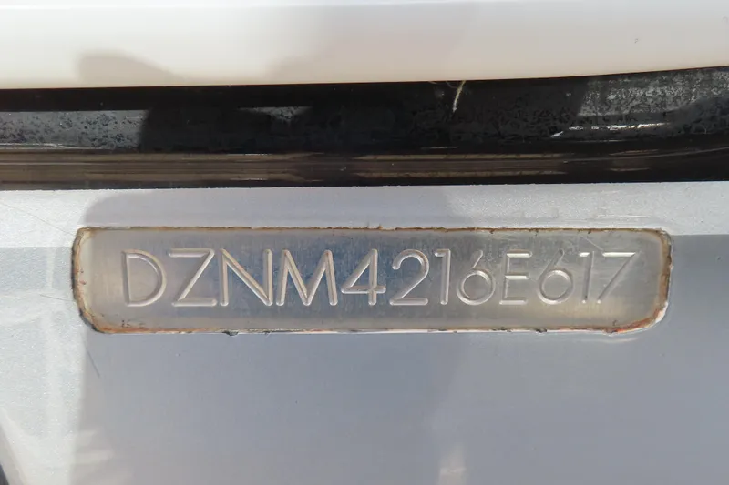 Slide: The Image of Close-up of a Mystic M4200 2017 vehicle identification number (VIN) plate. - 36