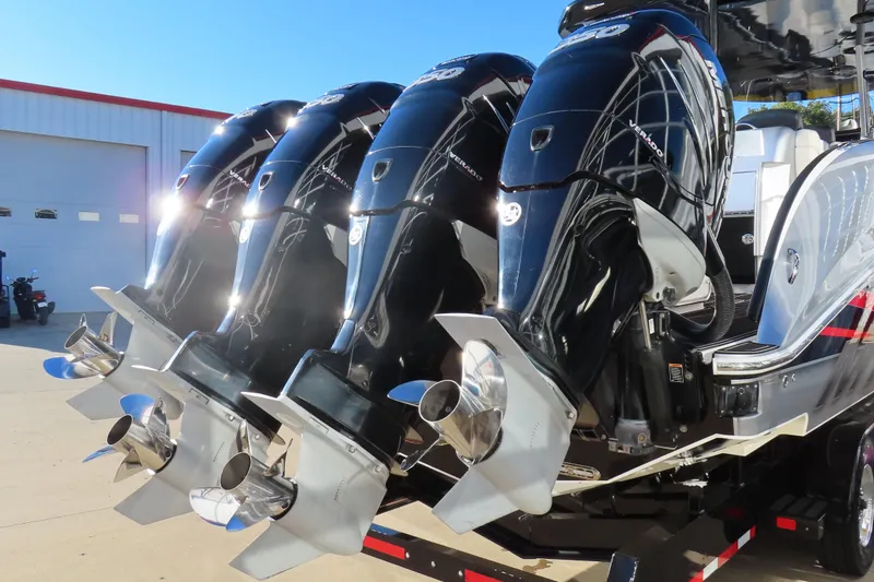 Slide: The Image of Four powerful outboard engines on a 2017 Mystic M4200 boat. - 6