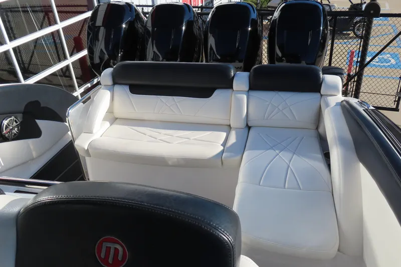 Slide: The Image of Luxurious seating on 2017 Mystic M4200 boat with sleek design and powerful engines. - 9