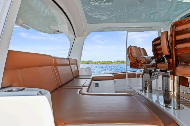 Slide: The Image of Luxurious interior of 2023 HCB 65 Estrella yacht with leather seating and ocean view. - 20