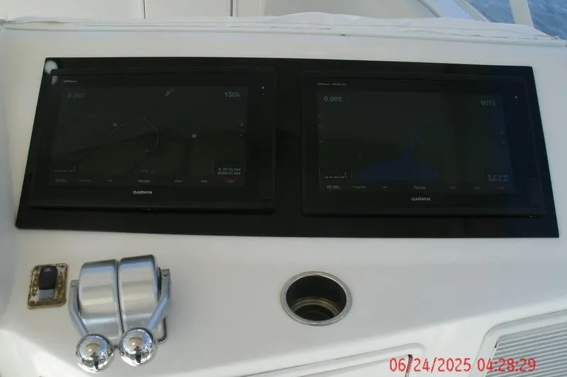 Slide: The Image of Control panel of a 1998 Ocean Yachts 48 Super Sport with Garmin displays. - 11