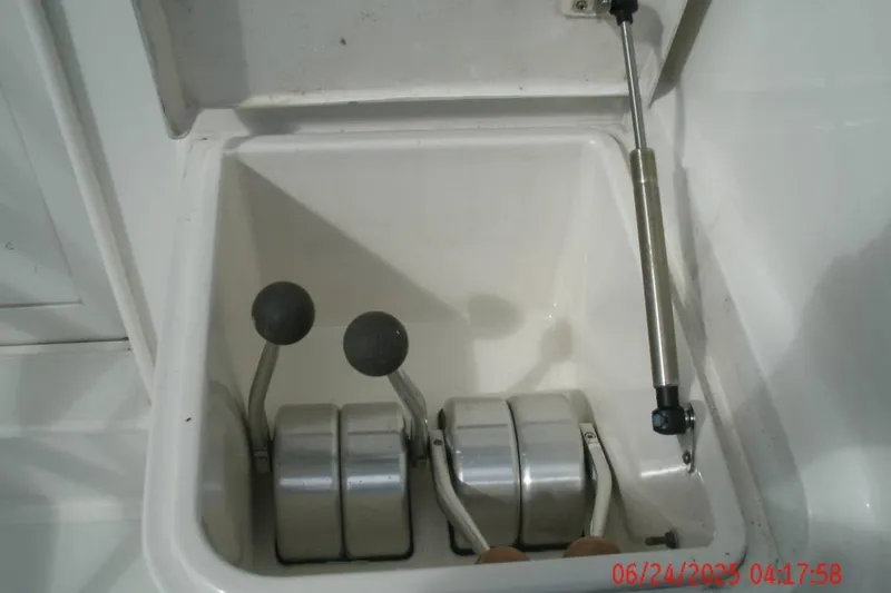Slide: The Image of Control levers in a 1998 Ocean Yachts 48 Super Sport boat compartment. - 8