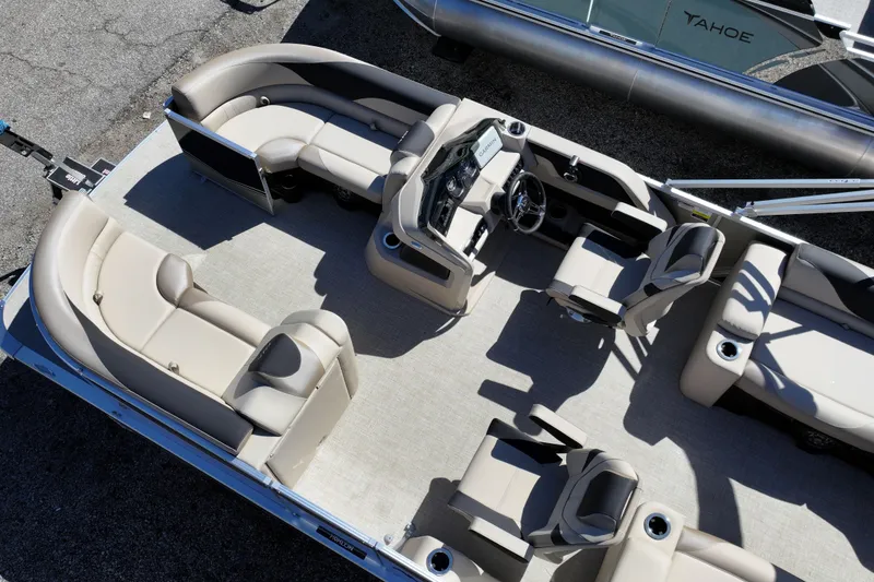 Slide: The Image of 2026 Avalon LSZ Quad Lounger Shift pontoon boat with spacious seating and modern design. - 12
