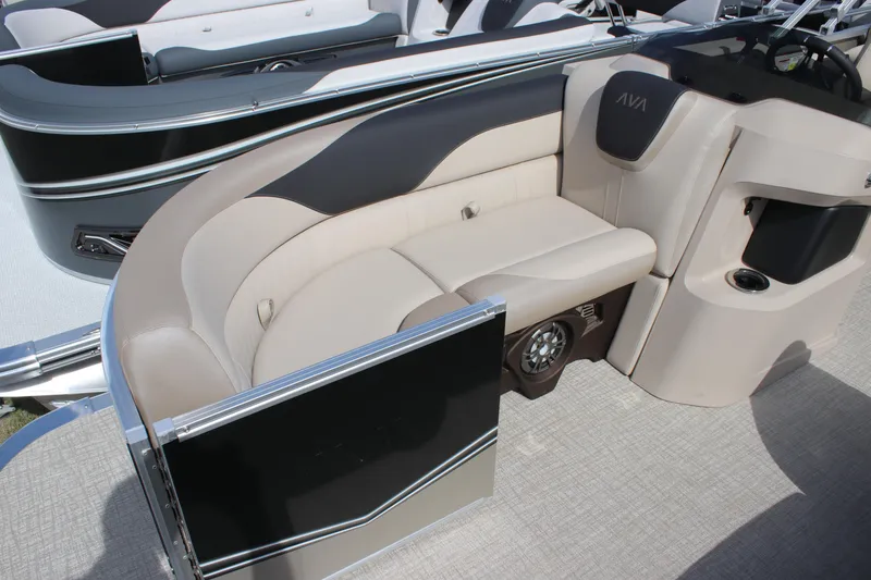 Slide: The Image of 2026 Avalon LSZ Quad Lounger Shift boat interior with beige seating and sleek design. - 3