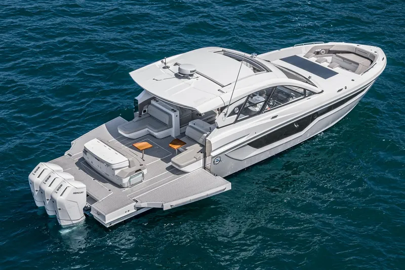 The Image of 2024 Cruisers Yachts 50 GLS luxury boat on open water. - 0