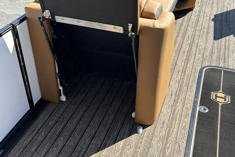Slide: The Image of 2026 Harris Cruiser 250 LUX boat interior with luxurious seating and stylish flooring. - 7