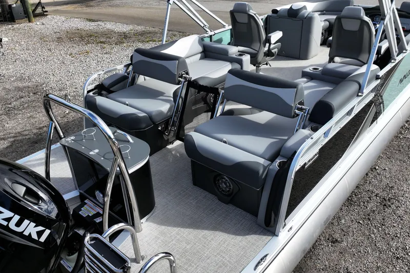 Slide: The Image of 2026 Avalon LSZ Quad Lounger Shift boat with sleek seating and Suzuki engine. - 3