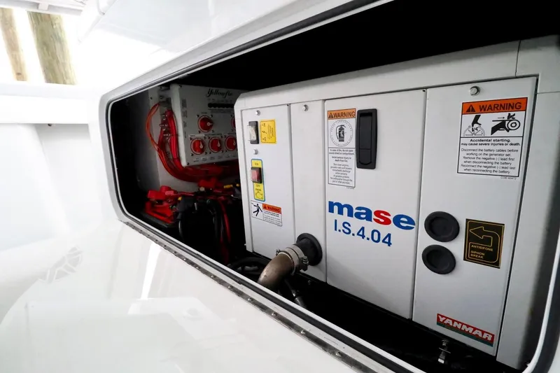 Slide: The Image of Engine compartment of 2023 Yellowfin 42 Offshore boat with Mase generator. - 15