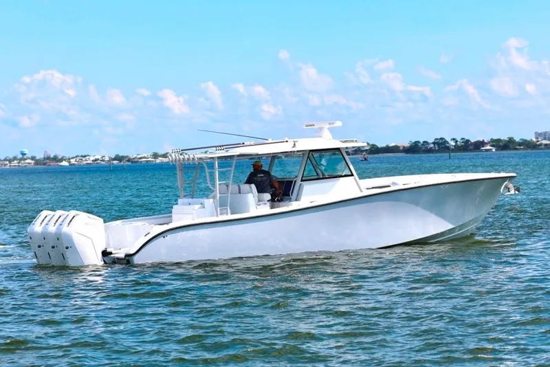 Slide: The Image of 2023 Yellowfin 42 Offshore boat cruising on a sunny day. - 30