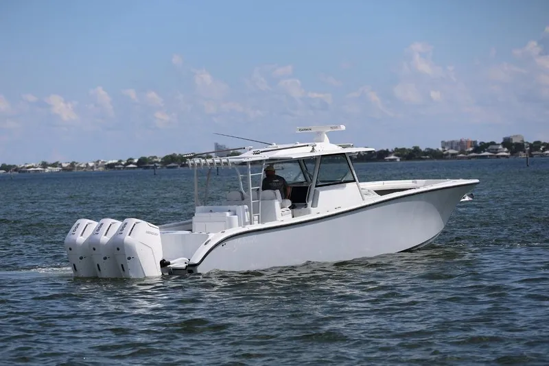 Slide: The Image of 2023 Yellowfin 42 Offshore boat cruising on open water. - 31