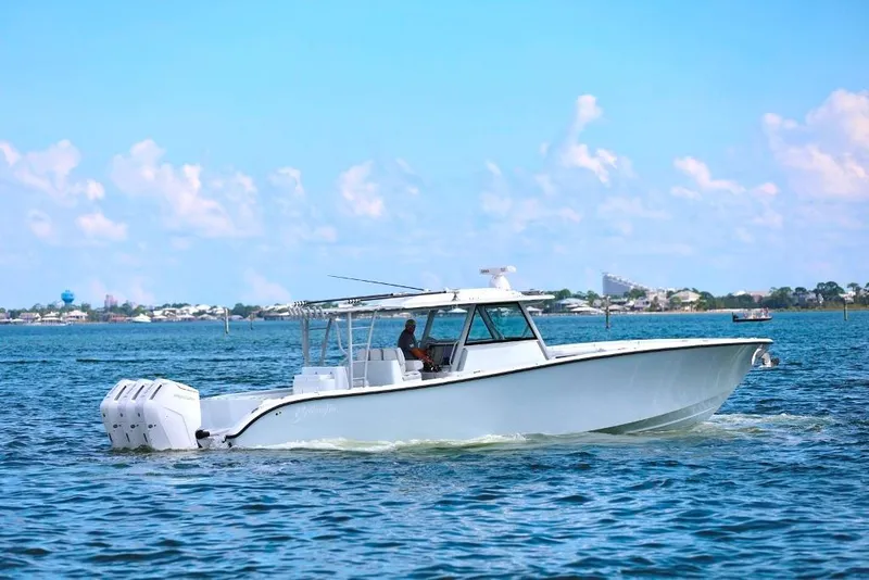 Slide: The Image of 2023 Yellowfin 42 Offshore boat cruising on a sunny day. - 38