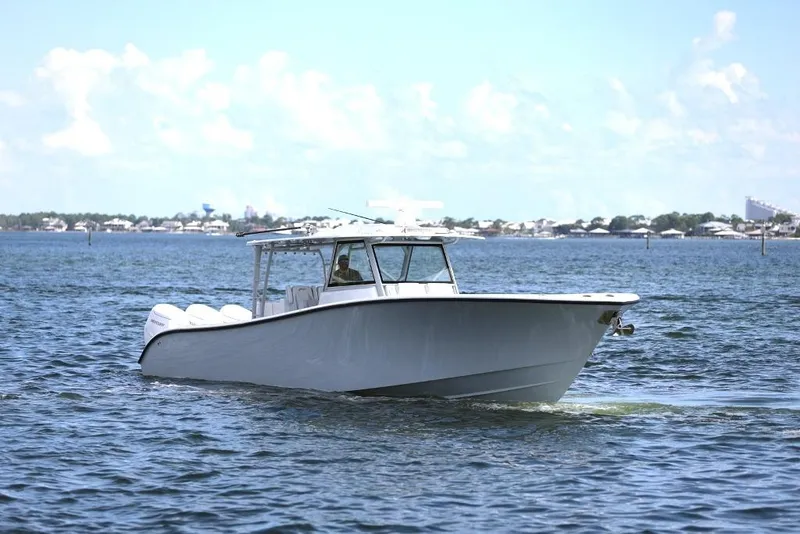 Slide: The Image of 2023 Yellowfin 42 Offshore boat cruising on open water. - 41